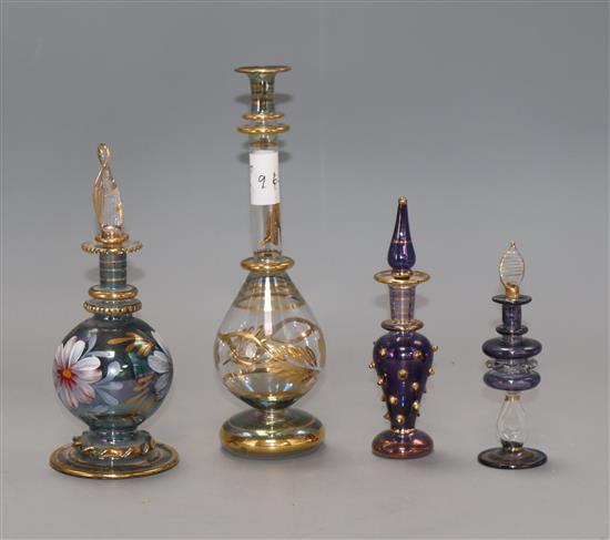Four coloured glass scent bottles